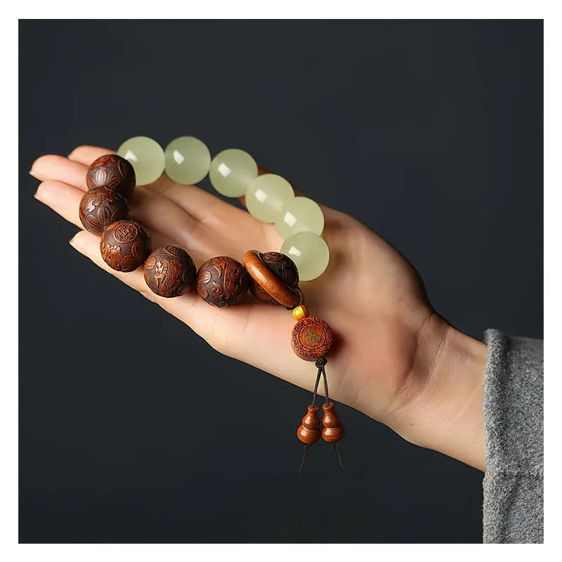 Rosewood flexible bracelet with carved Fu characters on 12 wooden pieces