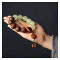 Rosewood flexible bracelet with carved Fu characters on 12 wooden pieces