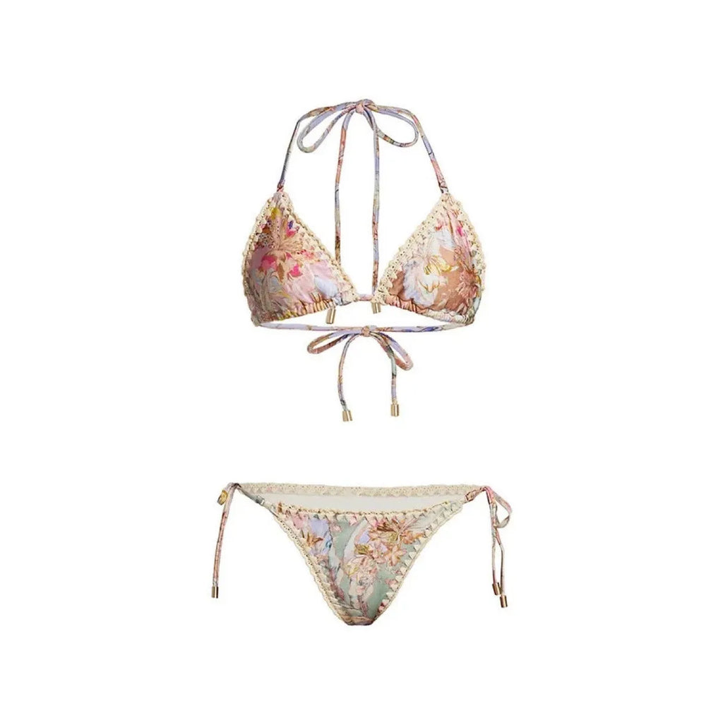 Women's creamy-white floral bikini set with matching skirt bottom