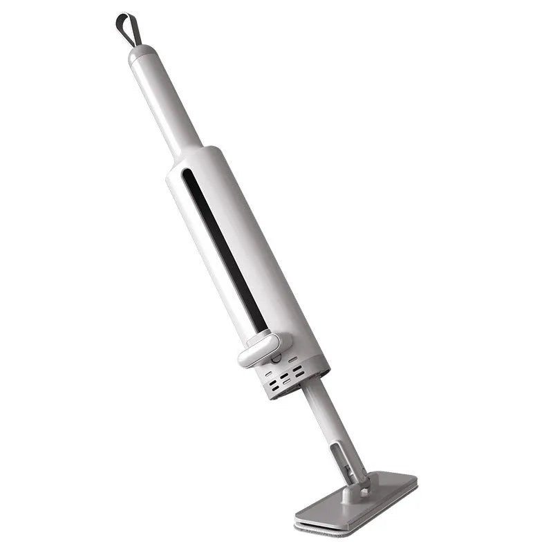 Pink rotatable self-squeeze mini flat mop with microfiber pad, shown extended to its full length.