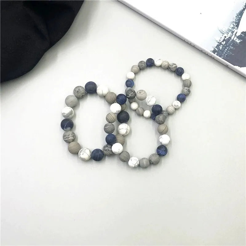 Universe Wind planet stone bracelet showing 10mm natural stone bead on adjustable hand-tied cord