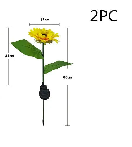 Set of LED solar sunflower garden lights with yellow Bujuan flower heads and stainless steel stems placed along a pathway