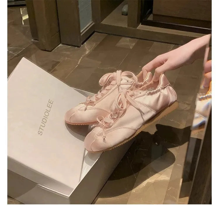 Women's satin ballet flats with round toe and lace-up closure in silver grey, pearl white and champagne pink colours