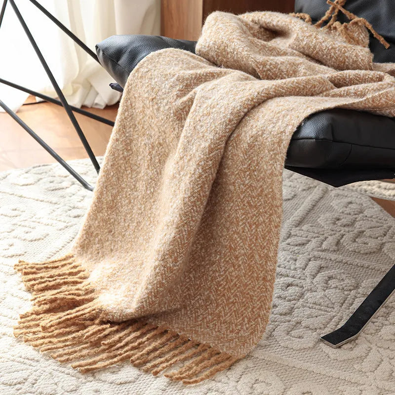 Polyester sofa blanket 120x170cm in khaki folded on a modern sofa