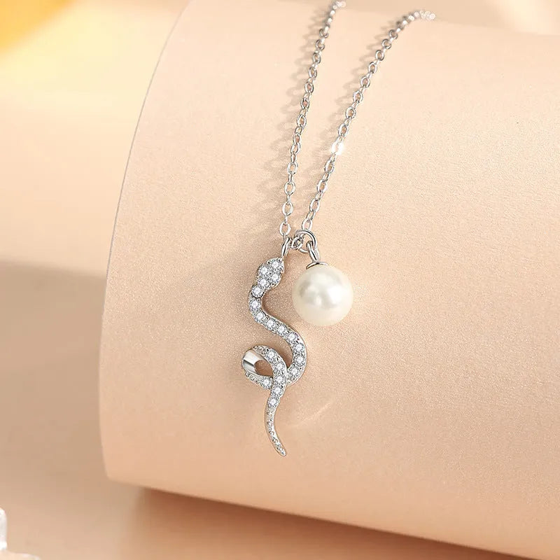 925 silver animal pendant necklace with platinum rose gold colour and Oring chain on a white background