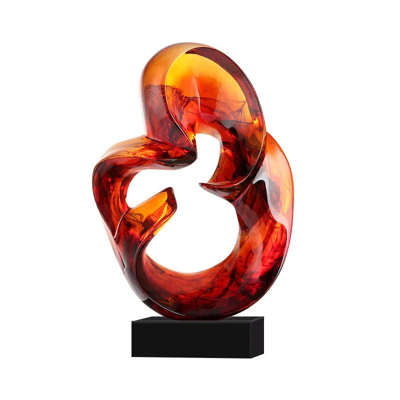 Transparent resin sculpture ornament in blue colour on display surface