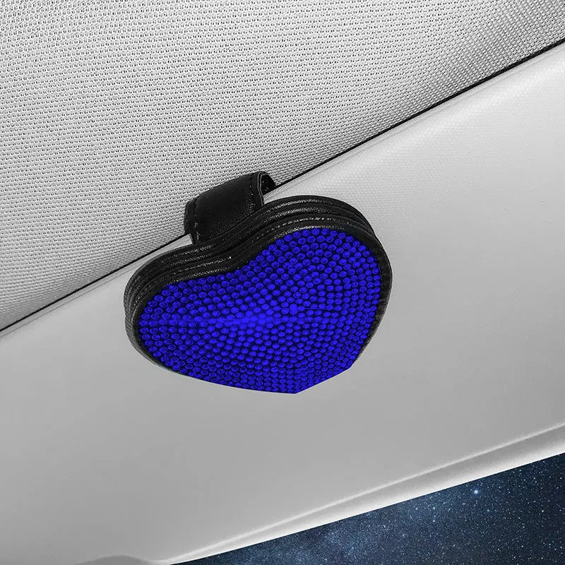 Magnetic PU leather car sun visor clip holding a pair of glasses, shown in a diamond-pattern colour.