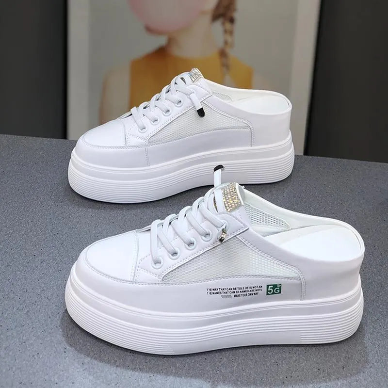 White women's platform shoes with mesh surface and heel-free design on rubber sole