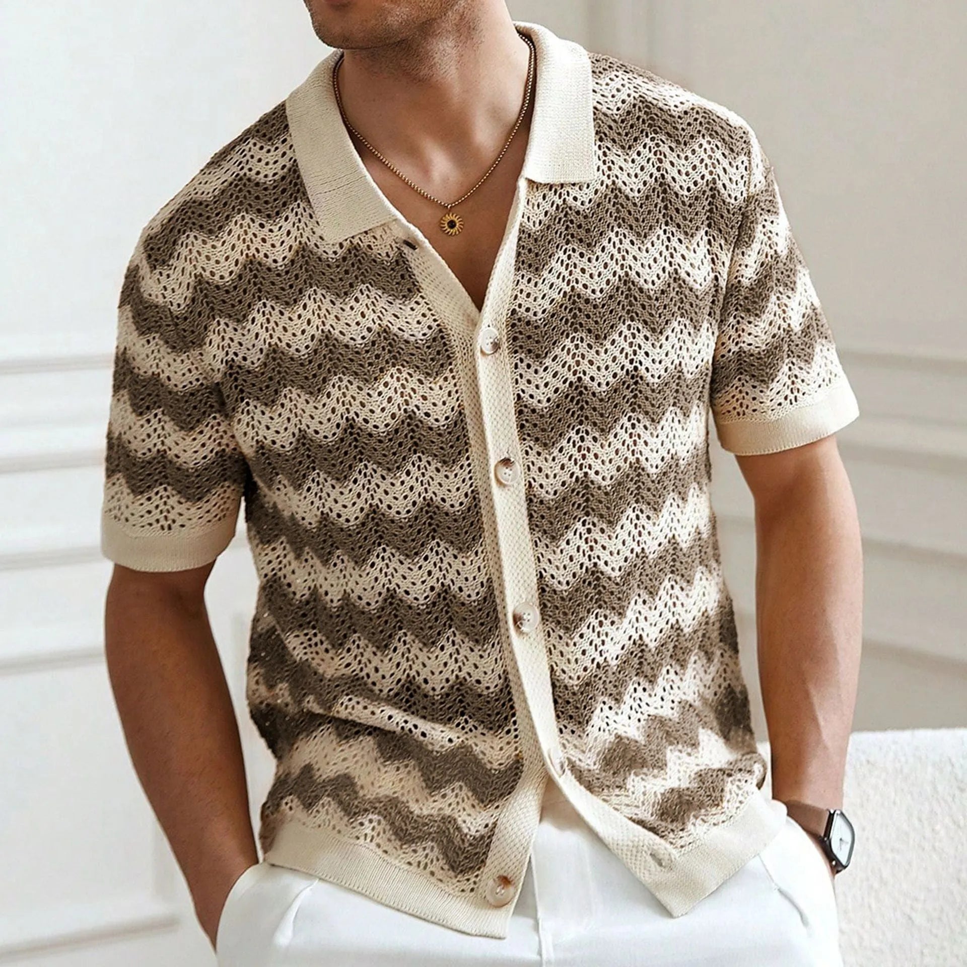 Short sleeve corrugated sweater in Tencel viscose with a textured hollow jacquard and flocked finish.