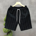 Men's black and white striped fleece-lined casual shorts with an elastic waistband