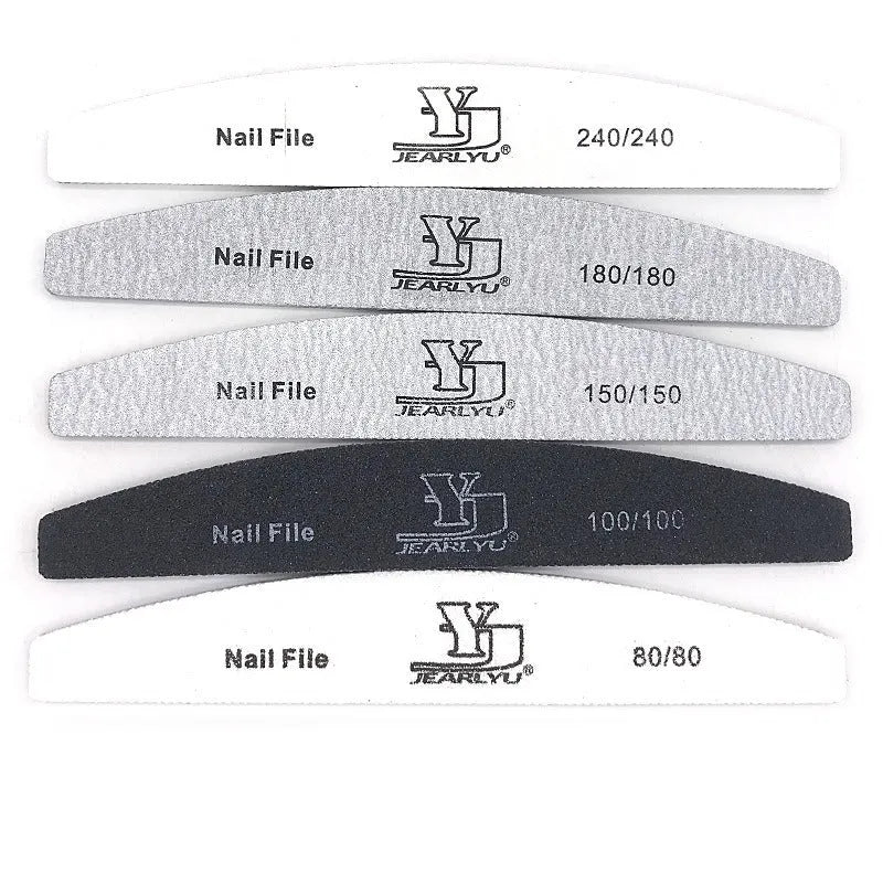Grey half-moon shaped nail file with washable grit surface on a plain background.