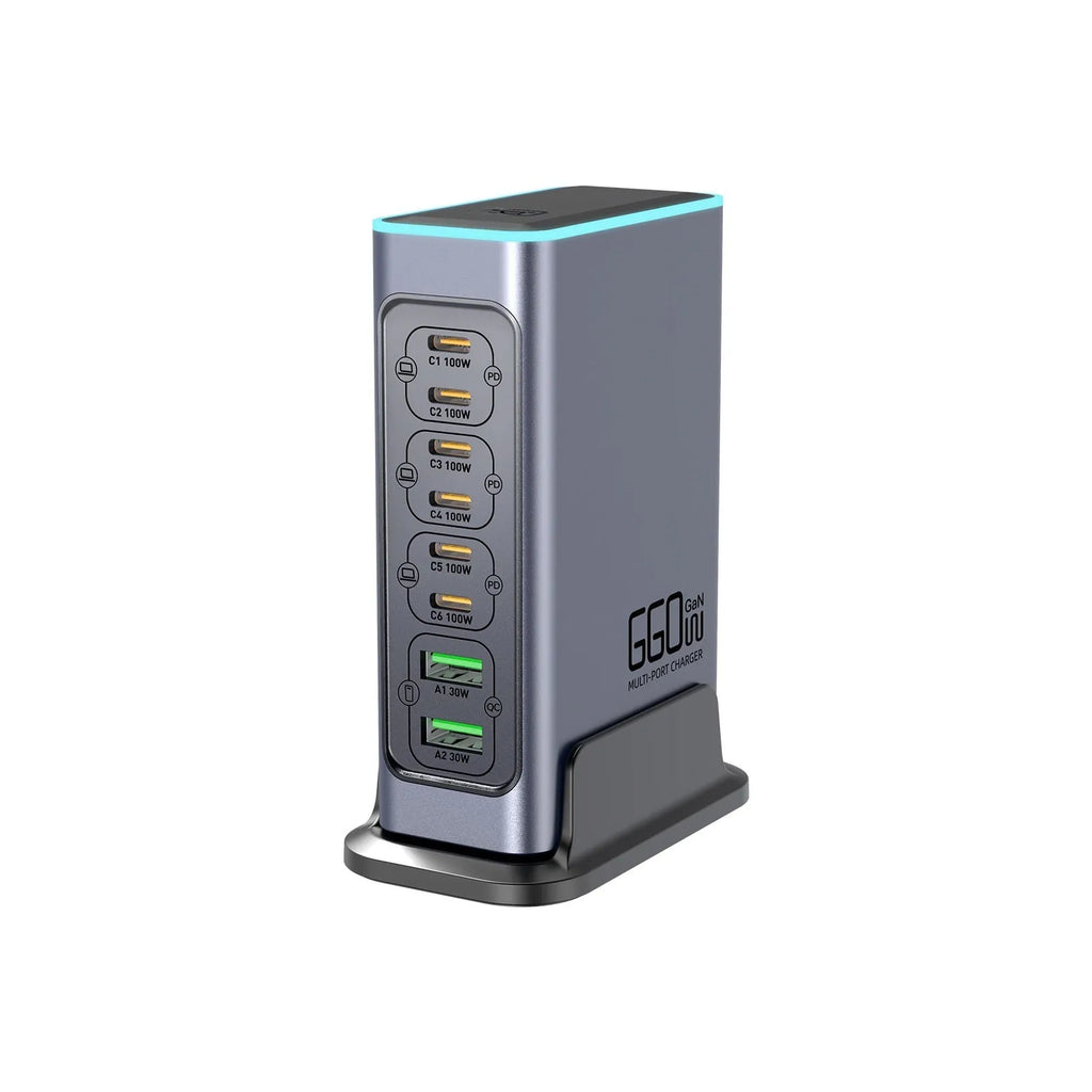 Silver 660W Gallium Nitride desktop fast charger with multiple USB-C ports on a wooden desk.