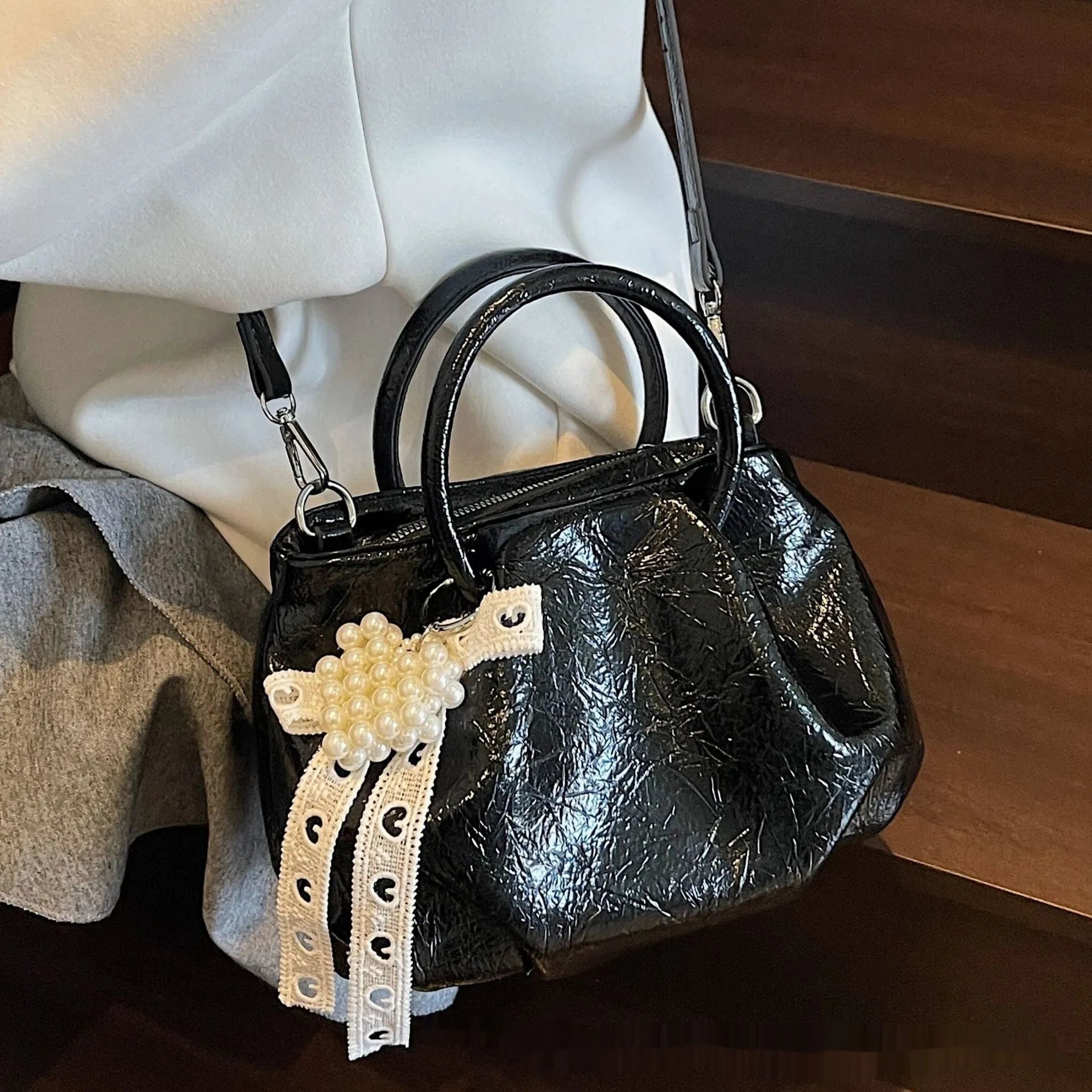 Portable solid colour cloud fashion shoulder small bag in urban simplicity bucket shape with slit pocket, PU material, beige colour