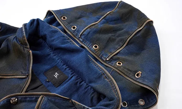 Blue hooded denim vest coat with matching trousers set on mannequin