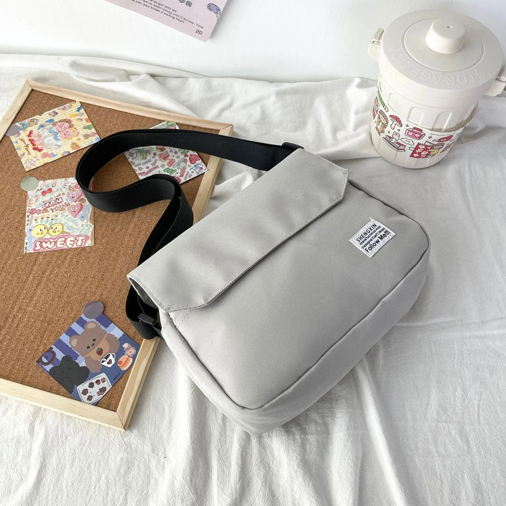 Oxford cloth crossbody messenger bag in solid colour for women and men with flap closure