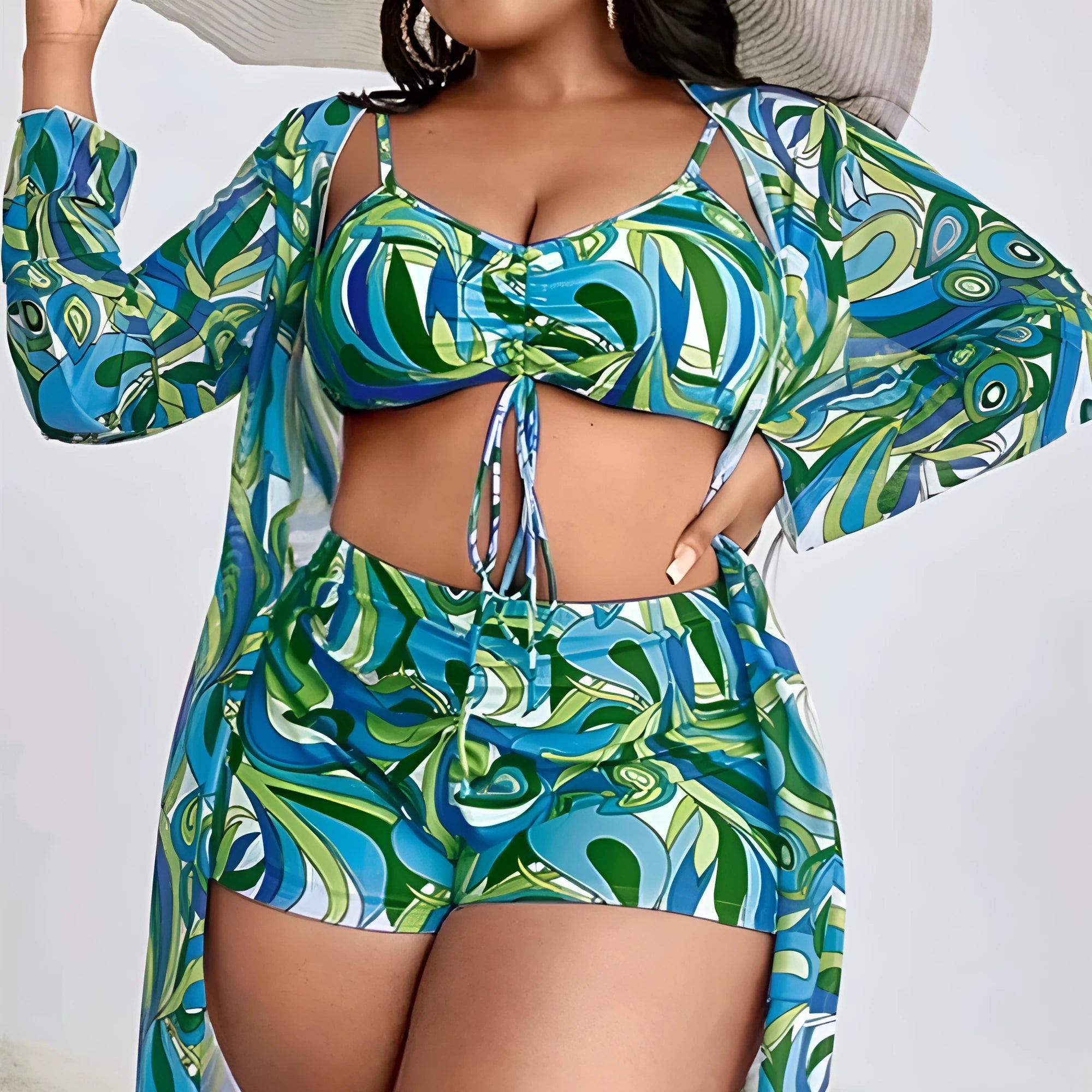 Women's floral print three-piece bikini set with cardigan on a mannequin.