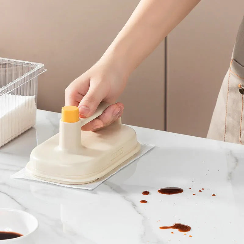 Disposable Magic Cleaning Brush with plastic handle, storage box, and 50 white non-woven fabric rag refills.