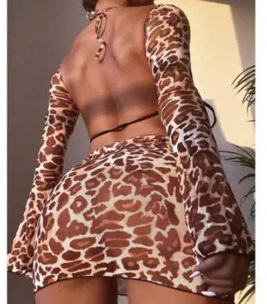Leopard print women's bikini set with coordinating skirt on hanger