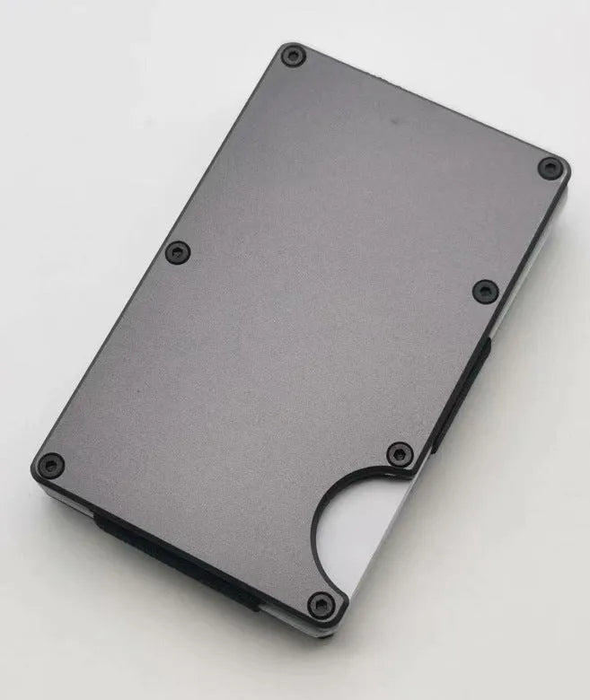 Slim aluminium alloy grey carbon fibre wallet with RFID blocking for cards.