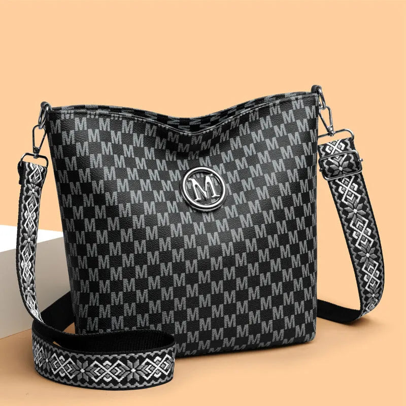 Retro dumpling-shaped women's shoulder bag in PU leather with zipper compartments