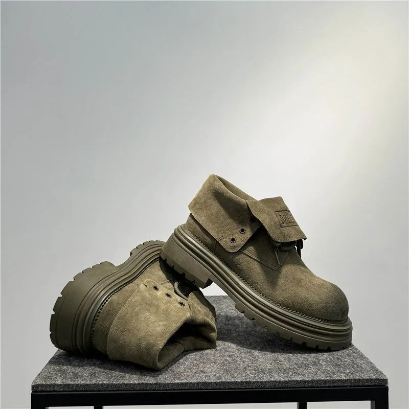 Retro distressed cow suede worker boots with thick soles in camel colour.