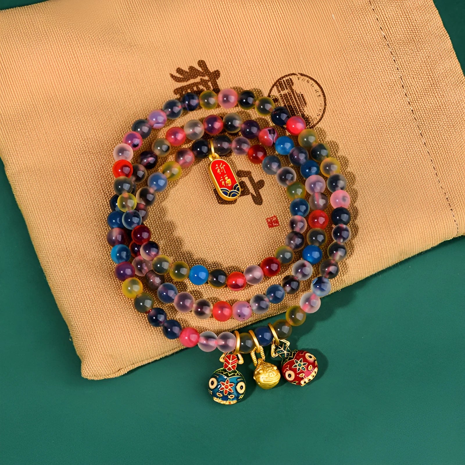 Dzogchen agate bracelet with gray glaze and gold beast decorative elements