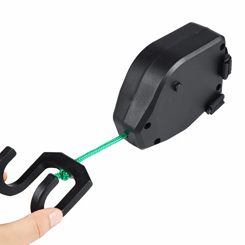 Black plastic mountain bike trailer traction device with adjustable trailer rope for child transport