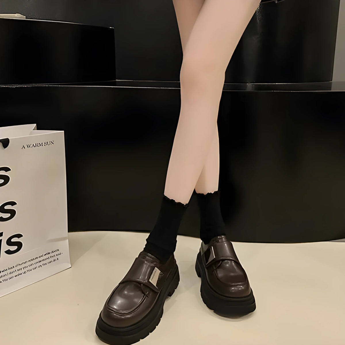 Women's black chunky heel British style shoes with square heel, cross strap, and round toe