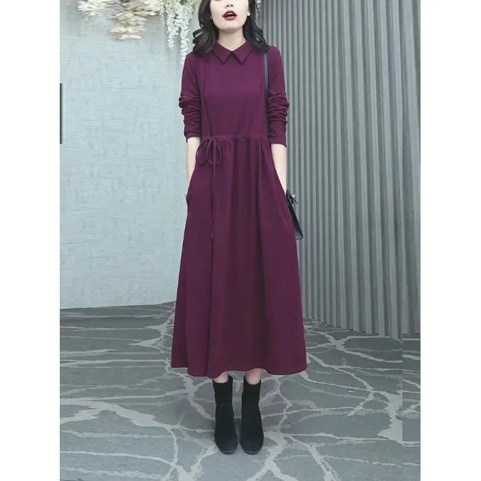 Purplish red plus size long sleeve dress with a long skirt for women.
