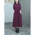 Purplish red plus size long sleeve dress with a long skirt for women.