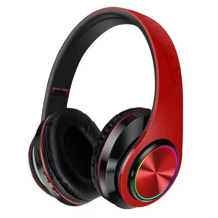 Black wireless over-ear Bluetooth gaming headset with LED breathing lights on the earcups.