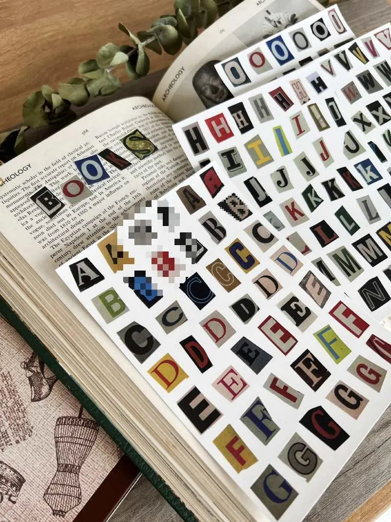 English letters and numbers symbol label sticker sheet with alphabet sets and week words in cute printed design