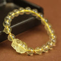 Yellow leather Pi Xiu bracelet with artificial crystal beads in Chinese simple style