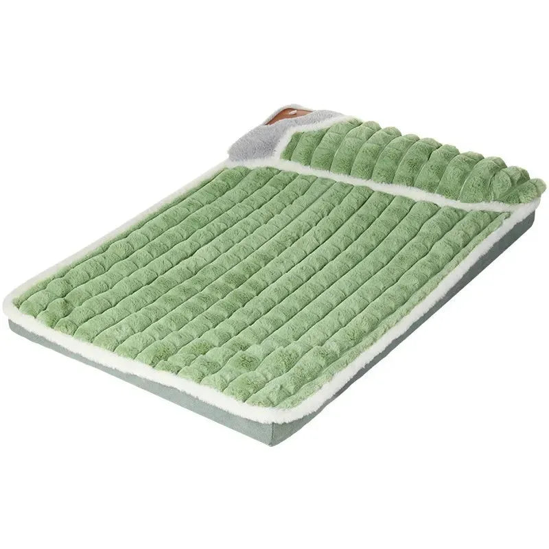 Large rectangular dog bed mat with a removable cover in a grey colour on a wooden floor.