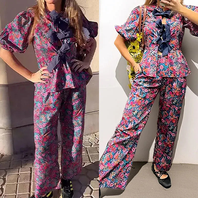 Women's floral printed trousers suit set with tie-neck puff sleeve top and matching trousers