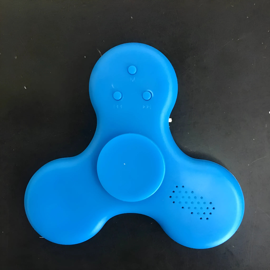 Square white Bluetooth speaker and fidget spinner toy with control buttons, measuring 80mm.