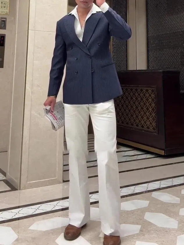 Men's classic stripe double-breasted blazer jacket on a hanger