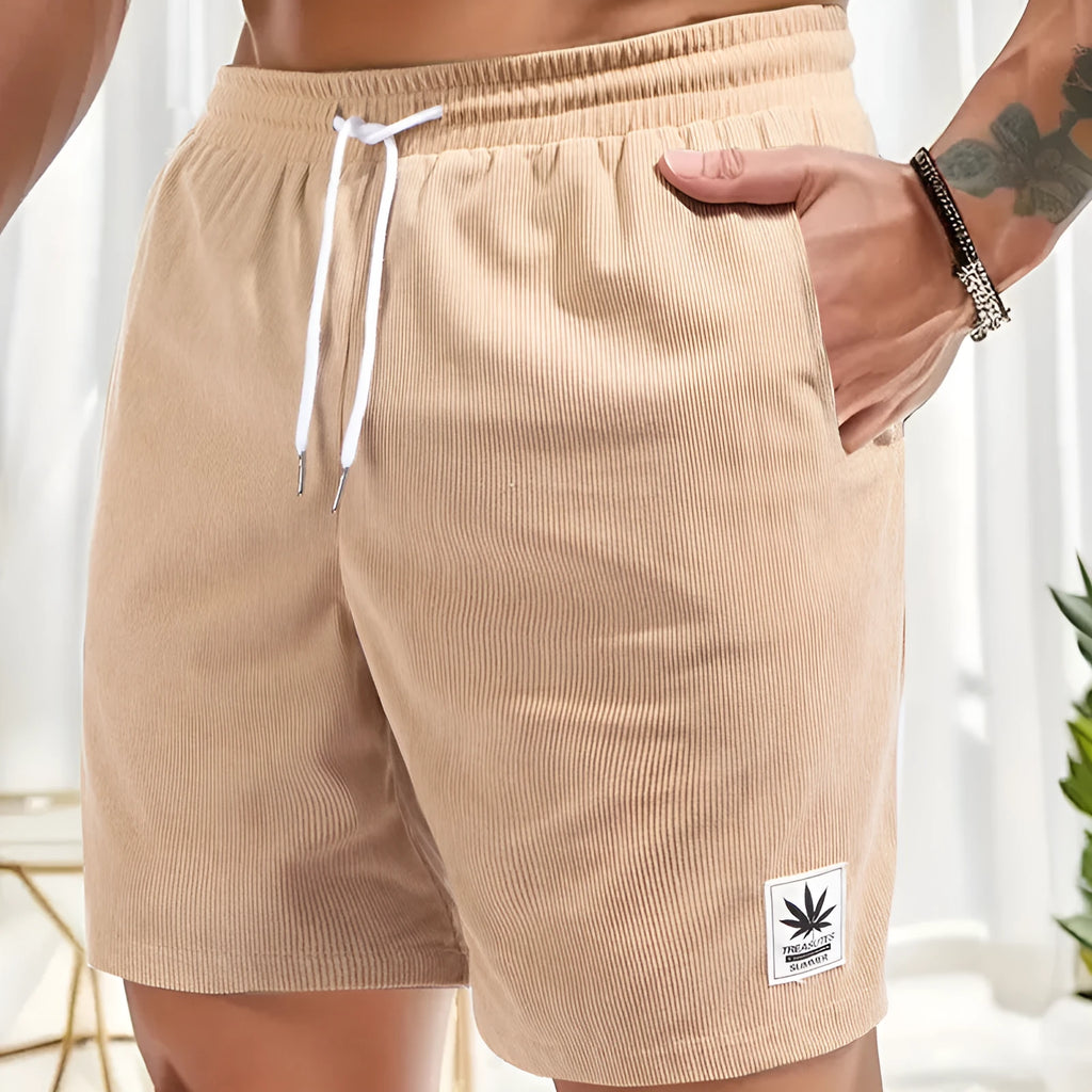 Man's drawstring waist summer shorts in blue, showing straight leg and casual fit