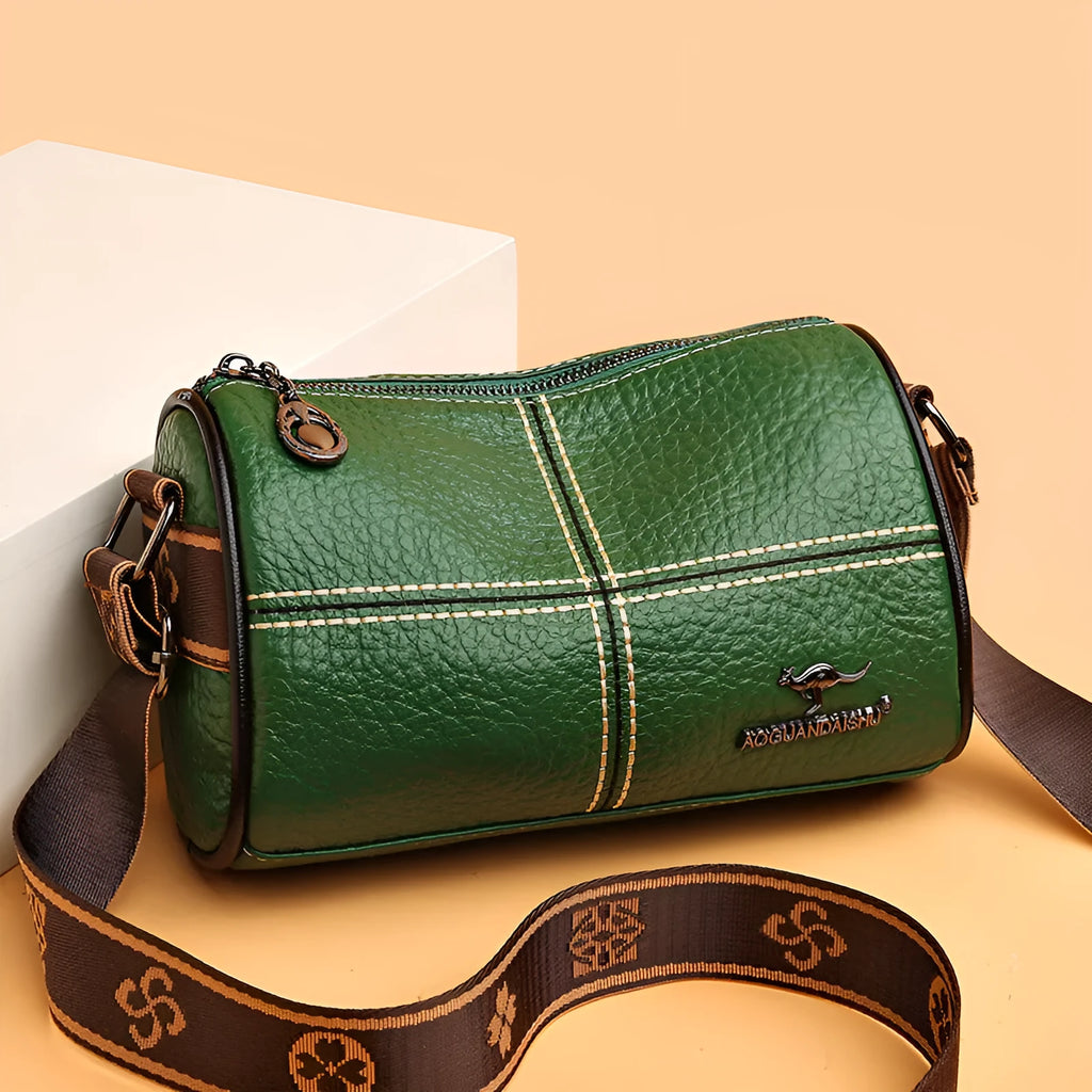Genuine leather women's cylindrical shoulder bag with stitched patchwork, zip pocket, phone pocket and document pocket
