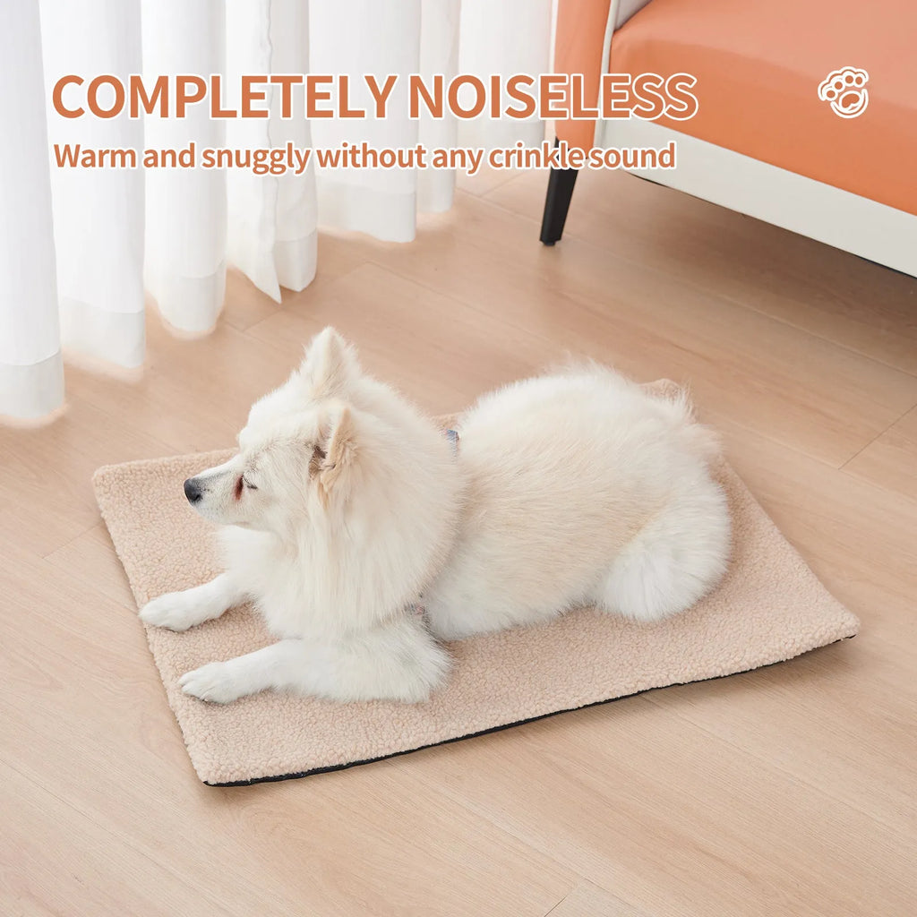 Grey self-heating plush pet pad for cats on a wooden floor