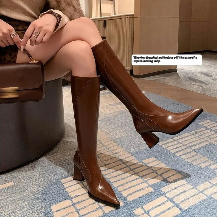 Women's black retro high heel riding boots with lace-up front and waterproof platform sole