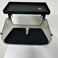 Black ABS plastic storage box fitted under the touchscreen of a Tesla Model Y interior.