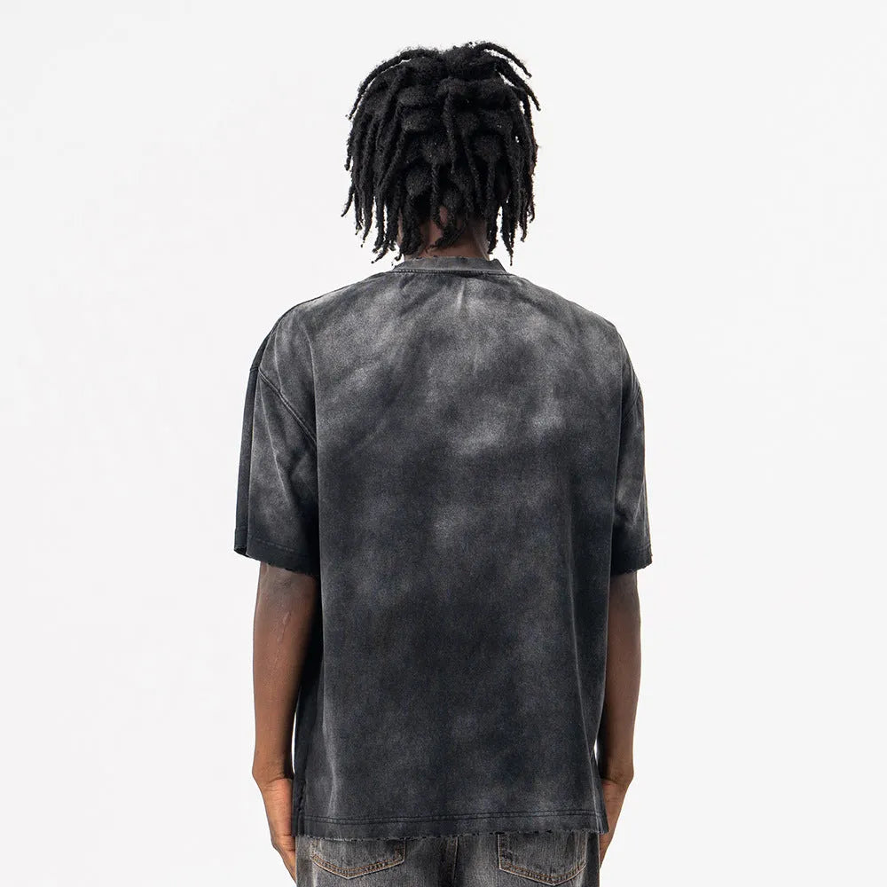 Men's black oversized cotton t-shirt with printed white letter design and drop-shoulder short sleeves