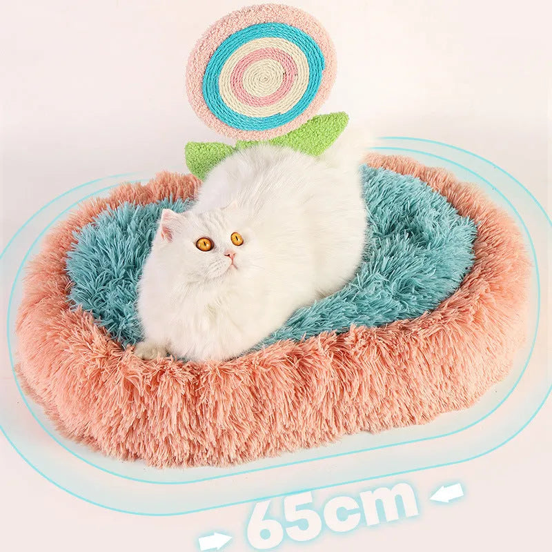 Pink elliptical plush cat nest bed with a soft padded base, shown disassembled.