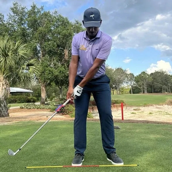 Plastic golf swing plane simulator training aid for improving club path mechanics