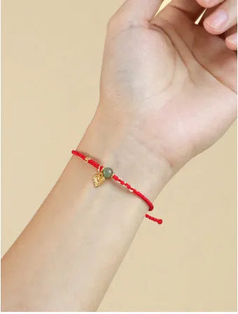Handmade woven bracelet with 925 silver and Hetian jade, red carrying strap