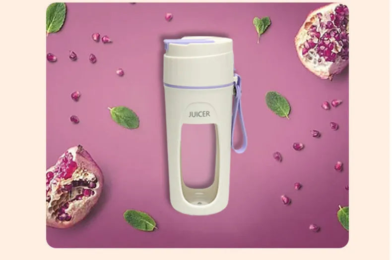 Portable USB rechargeable blender with borosilicate glass cup in fresh orange, grass green, and light purple colours.