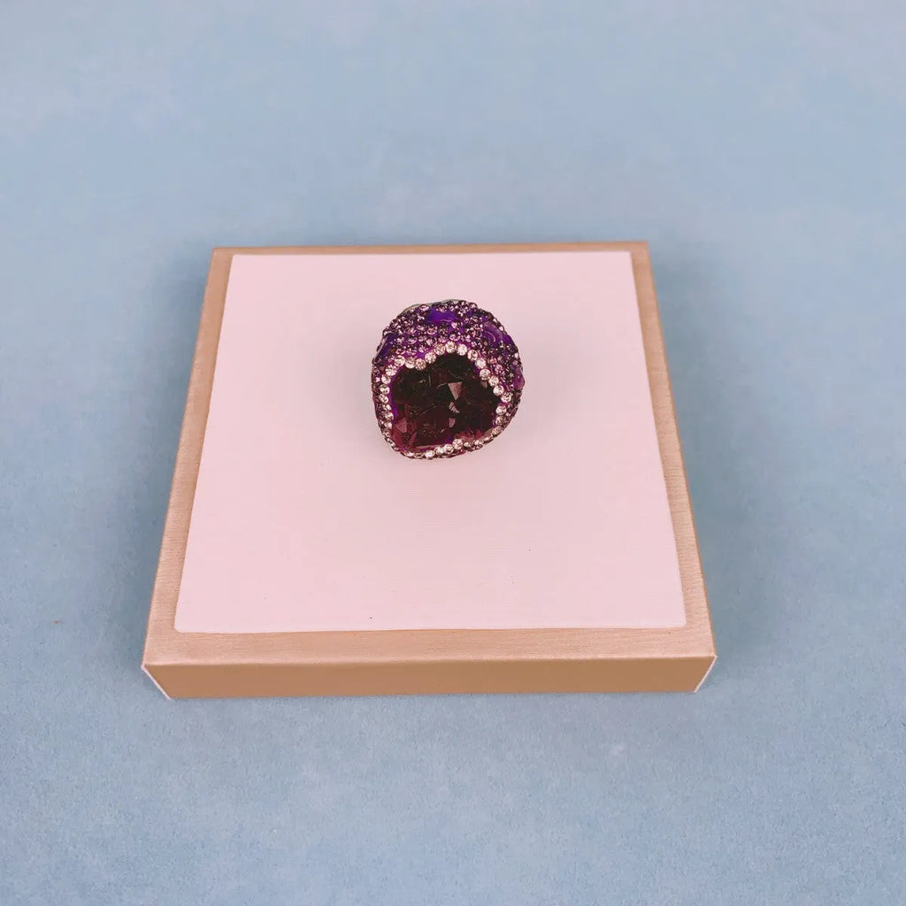 Natural Uruguay amethyst open adjustable ring on a white background showing the gemstone and open band design