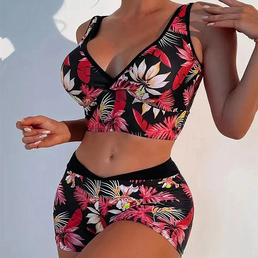 Two-piece female swimsuit set with printed boxer brief bottoms and sleeveless top