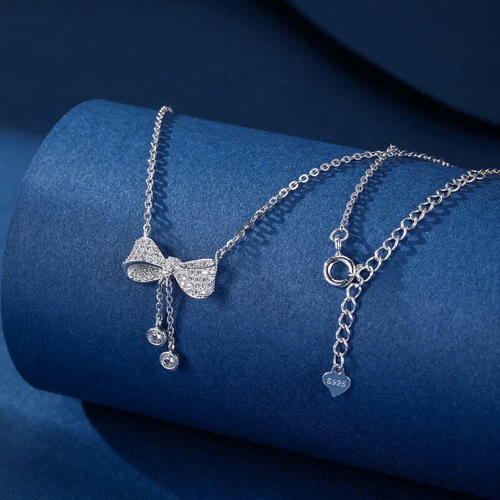 Sterling silver bow necklace with adjustable 40-45cm chain and O-ring design